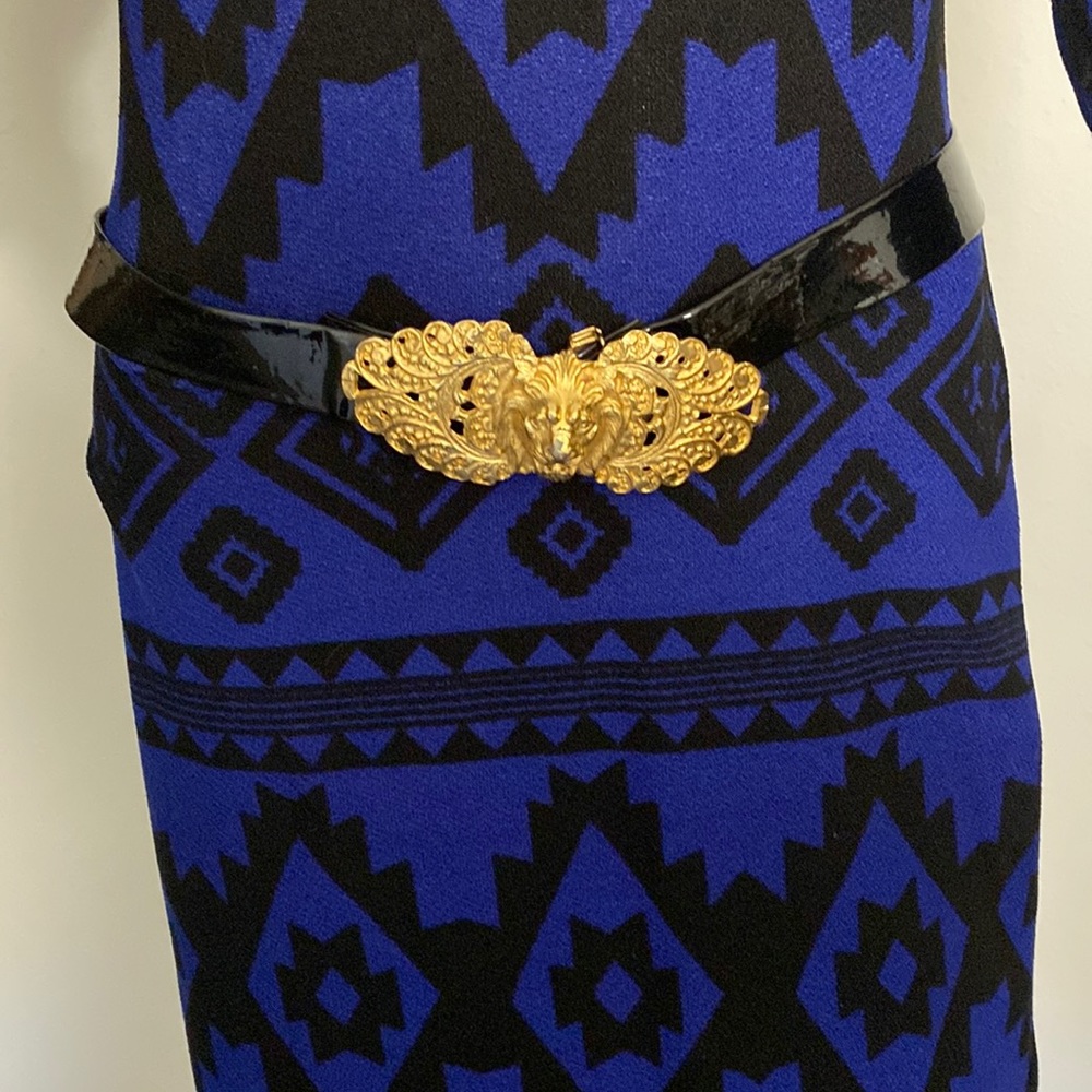 Authentic Versace Belt.   Tip Of Lion a little blemished.  32 Inches long.